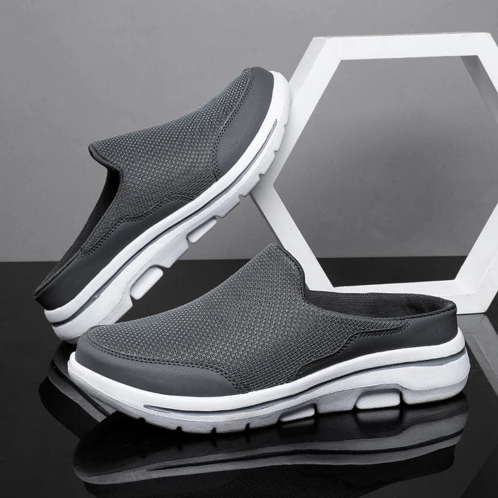 Versatile men's slip-on mule sandals, closed toe, great for relaxed summer days.