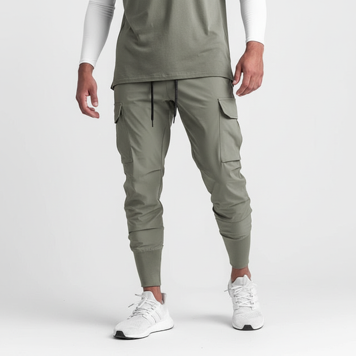 Stylish men's stretch jogger pants featuring convenient pockets, ideal for everyday comfort & urban fashion.