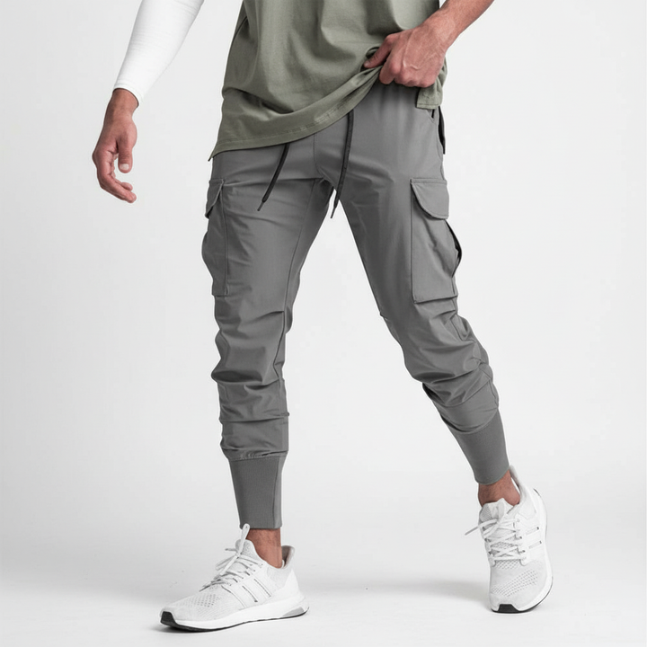 Urban fashion men's stretch jogger pants with multiple pockets, blending style, comfort & functionality.