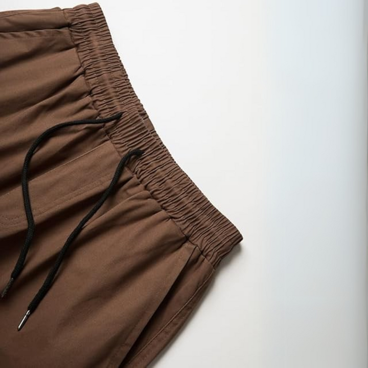 Men's dynamic cargo joggers, showcasing a comfortable loose fit for active lifestyle & versatile everyday wear.