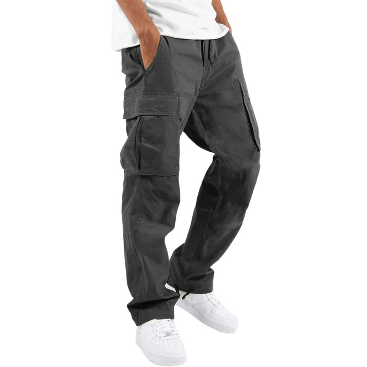 Close-up: Men's comfortable cargo joggers fabric texture. Ideal activewear for versatile style & casual comfort.