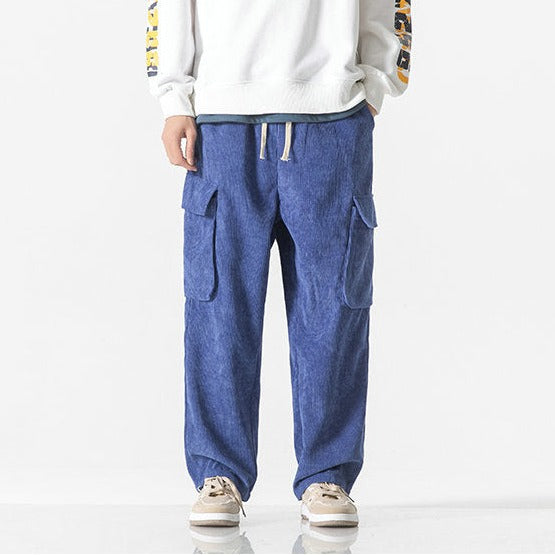 Relaxed fit men's cargo pants, comfortable with adjustable drawstring, great for casual fashion.