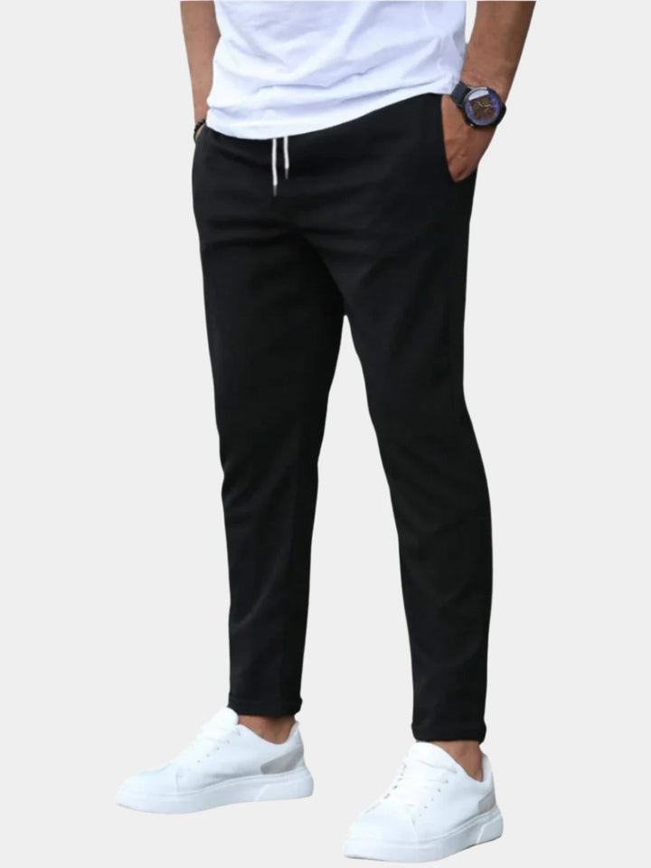 Men's comfortable drawstring chino pants for versatile everyday wear.