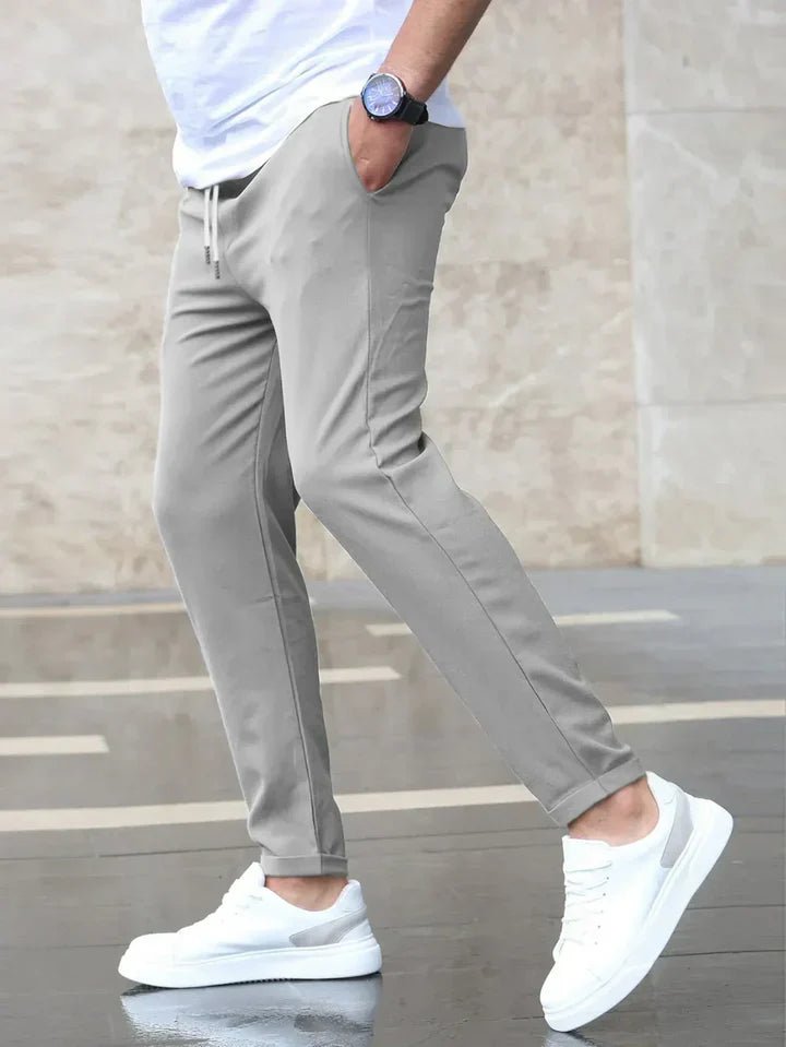 Men's comfortable slim fit drawstring chino pants, great for everyday versatility.