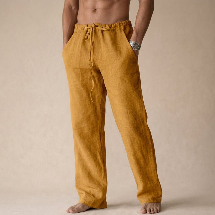 Relaxed fit men's linen pants with drawstring, lightweight and breathable for hot summer days. Men's fashion.