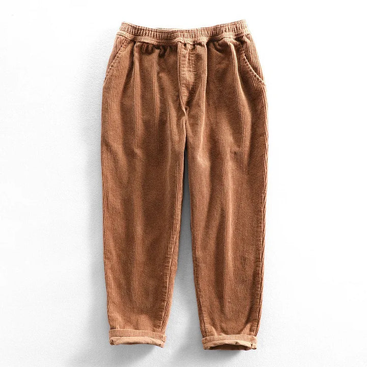Brown men's versatile Oslo style casual trousers with comfortable stretch waist, ideal for everyday wear.