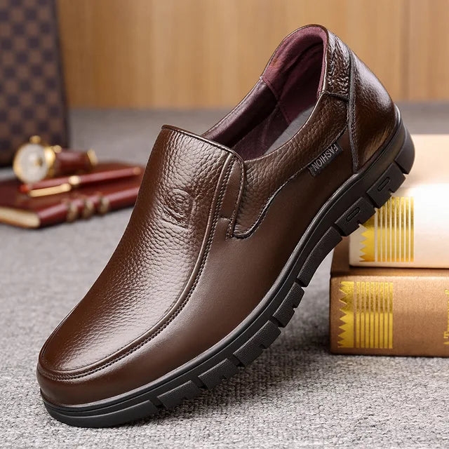 Classic black men's comfortable slip-on loafers, essential casual shoes for daily wear.