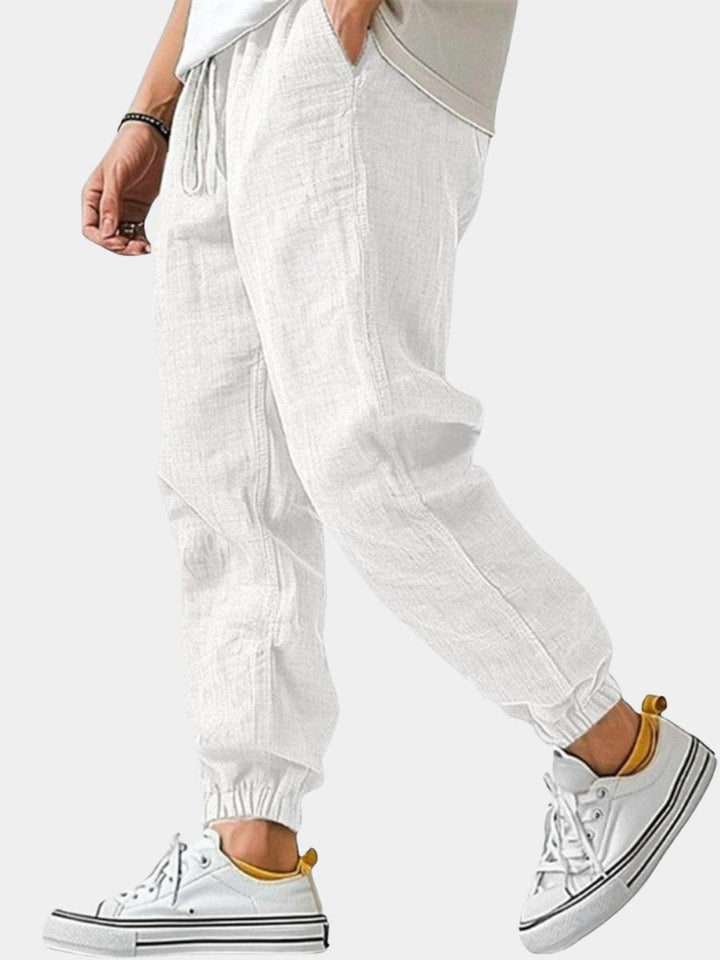 Men's comfortable tapered joggers, cuffed ankles, perfect for everyday wear & travel.
