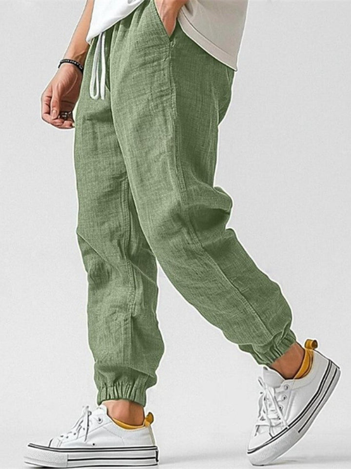 Versatile men's trackpants, tapered fit & cuffed hem, great for spring fashion & summer style.