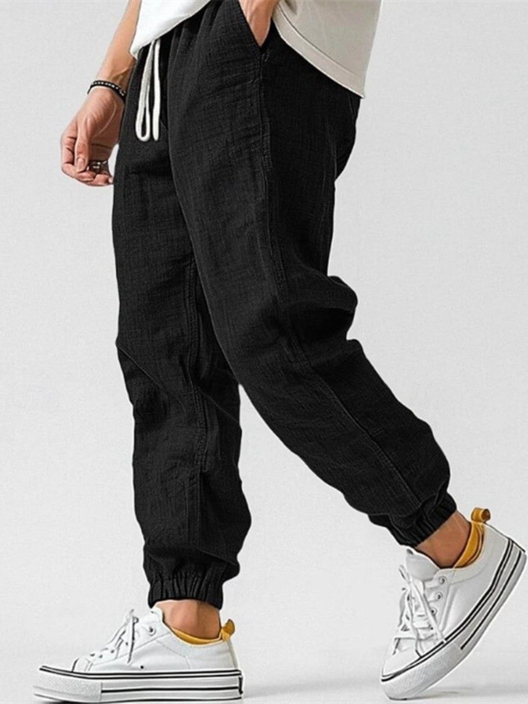 Classic men's comfortable tapered joggers with cuffed ankles, ideal for relaxed everyday casual wear.