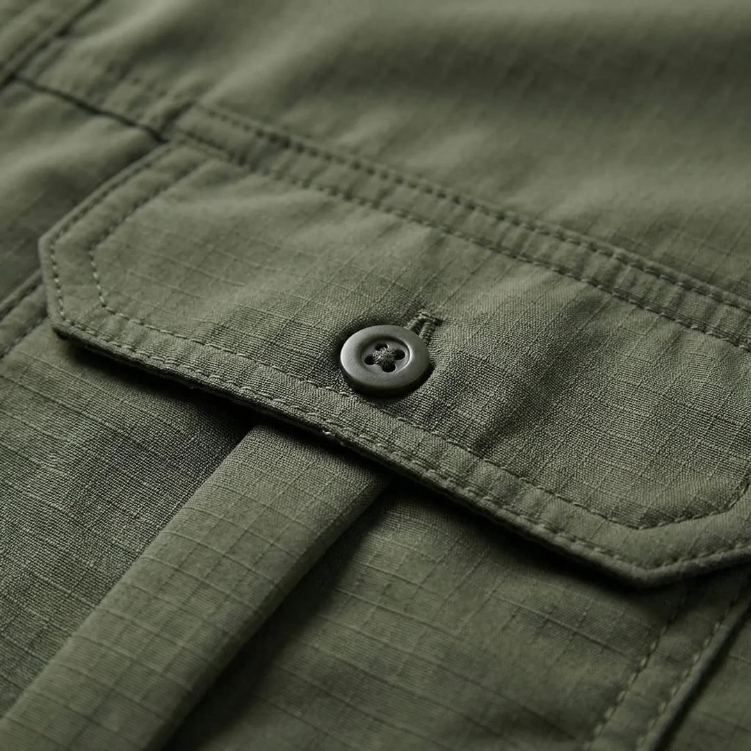 Versatile men's travel shirt, convertible with zip-off sleeves, ideal for various outdoor adventures.