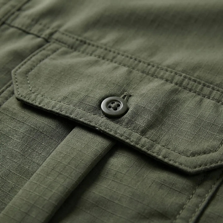 Versatile men's travel shirt, convertible with zip-off sleeves, ideal for various outdoor adventures.