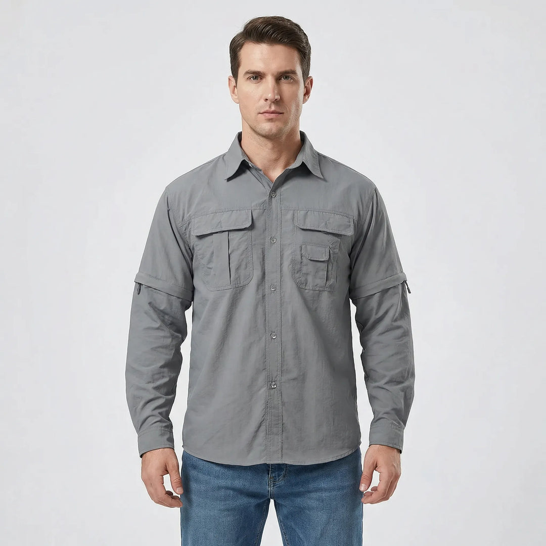 Practical men's trekking shirt with zip-off sleeves for adaptability and quick-dry comfort on the trail.