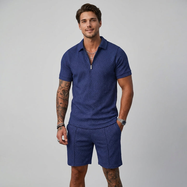 Stylish men's matching summer co-ord: short-sleeve zip polo and textured shorts. Ideal for men's fashion.