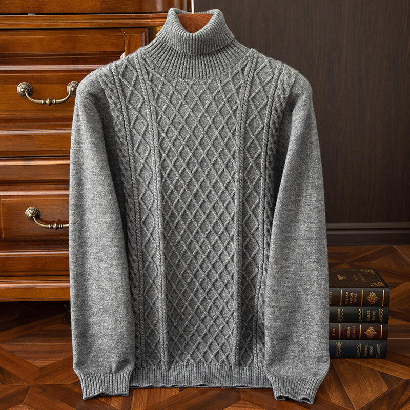 Warm men's cable knit turtleneck sweater with long sleeves, ideal for fall and winter comfort.