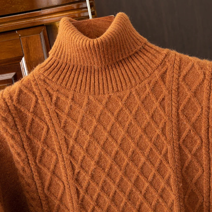 Stylish men's cozy cable knit turtleneck sweater, a warm long sleeve classic for mens winter style.