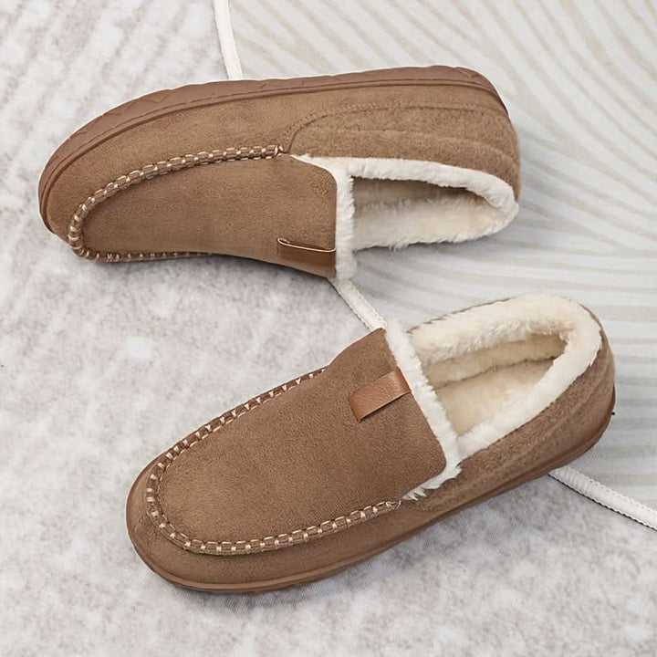 Men's durable slip-on house shoes, offering cozy warmth and support for winter indoor use.