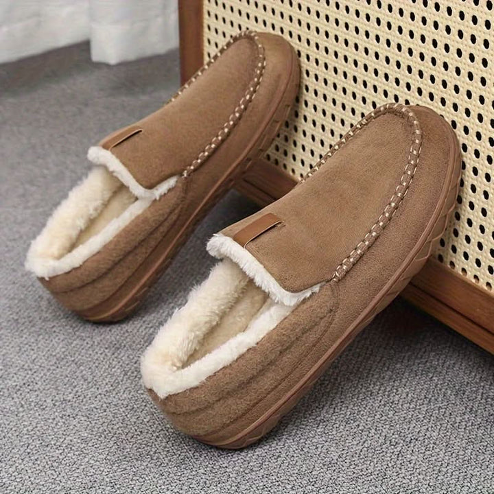 Comfortable men's loafer slippers, perfect for winter warmth & cozy indoor relaxation.