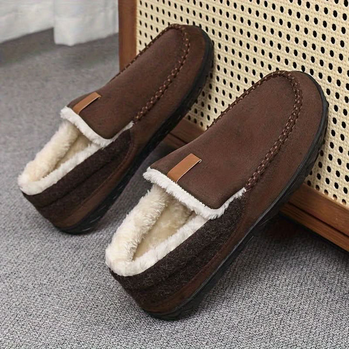 Stylish men's cozy slip-on slippers, perfect as warm house shoes for winter comfort.