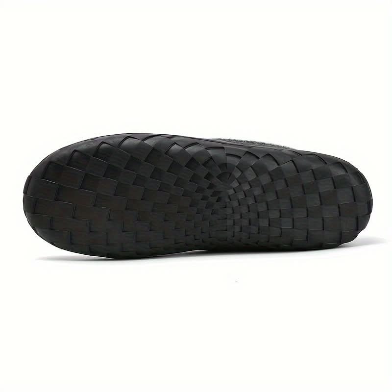 Men's easy slip-on house shoes, providing essential warmth and comfort for cold winter days.