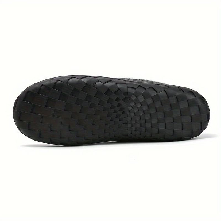 Men's easy slip-on house shoes, providing essential warmth and comfort for cold winter days.
