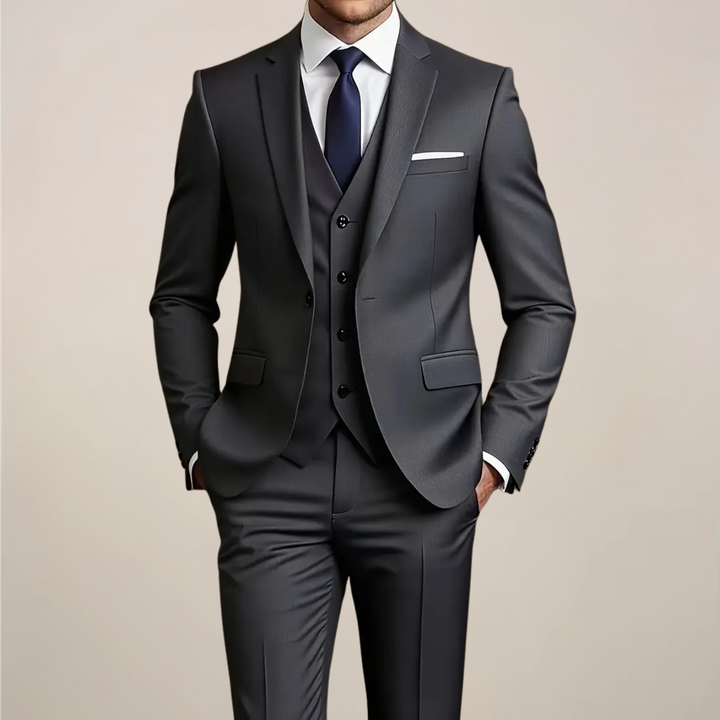 Men's dark grey slim fit three-piece suit, perfect for formal occasions, weddings, or business events.