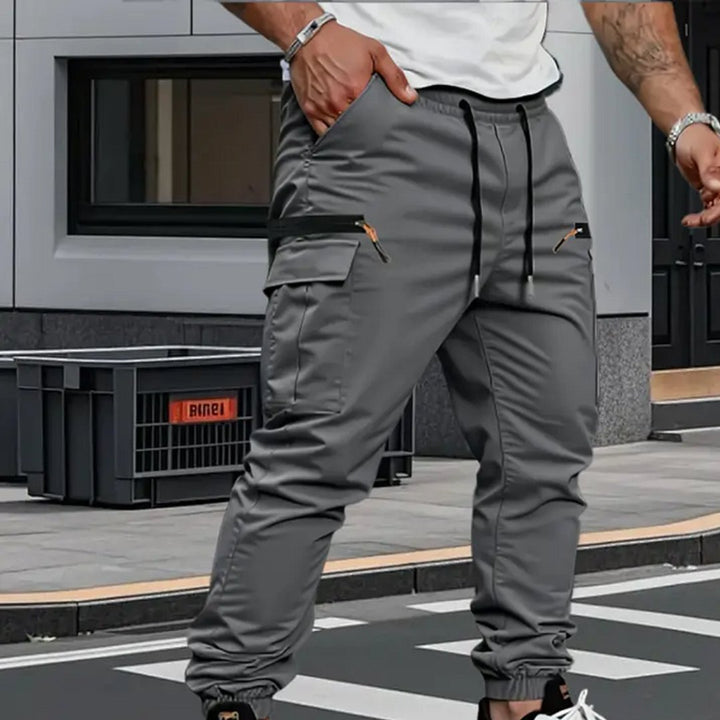 Versatile men's stretch cargo jogger pants, perfect for activewear, casual comfort, & everyday utility.