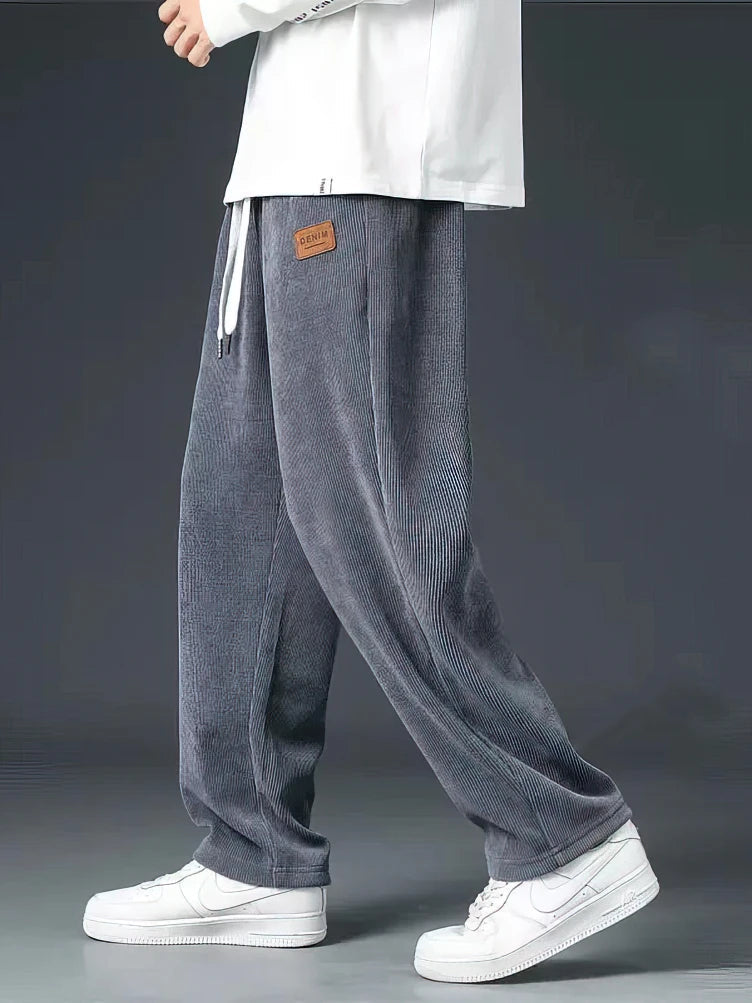 Close-up of Echelon men's grey comfort pants, highlighting the relaxed fit & comfortable elastic waist.