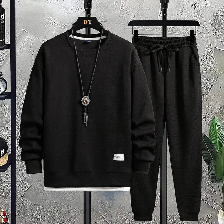 Soft knit men's leisure set, perfect for home lounging or stylish casual wear. Effortless comfort.