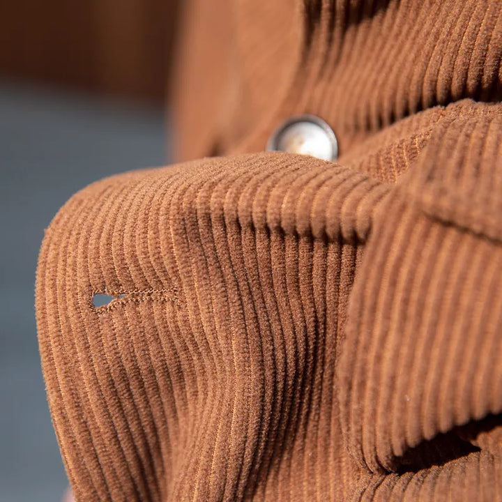 Men's formal herringbone jacket, tailored for a sharp fit, featuring distinctive gold buttons for business attire.