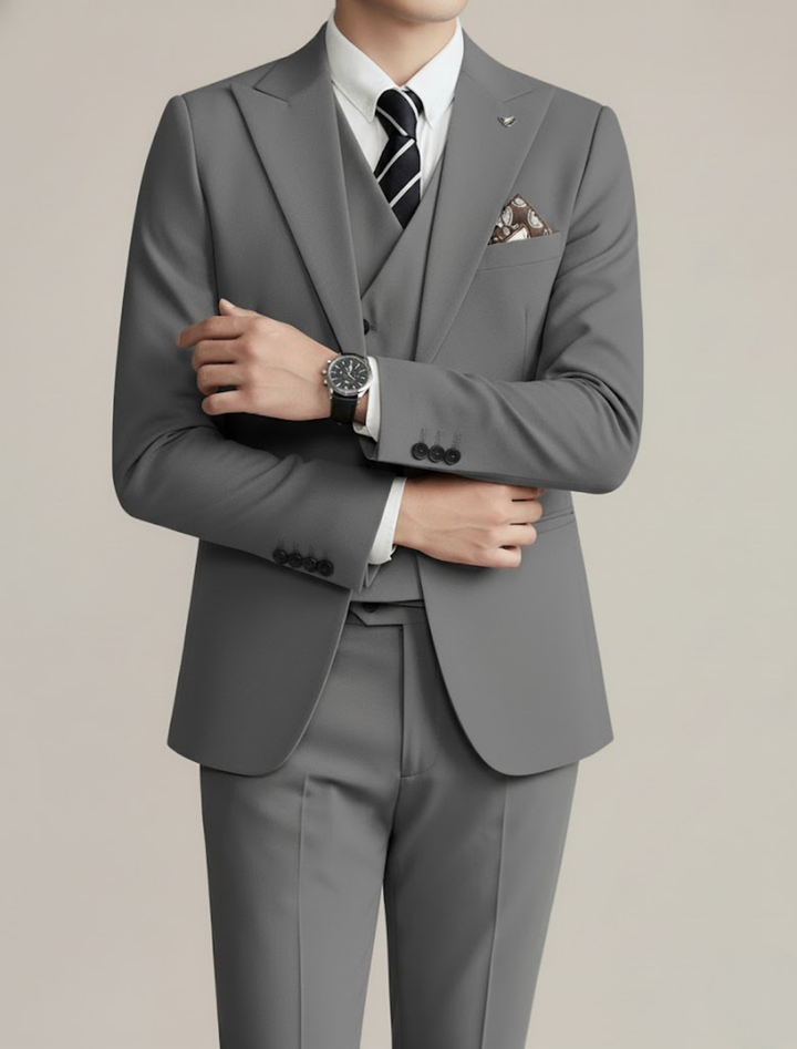 Modern men's three-piece suit, slim fit & tailored, perfect for fashion-forward formal wear & special occasions.