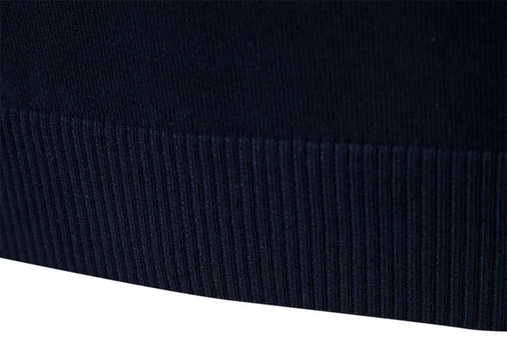Men's fashion striped half-zip sweater. This warm long-sleeve casual pullover is a must for fall menswear.