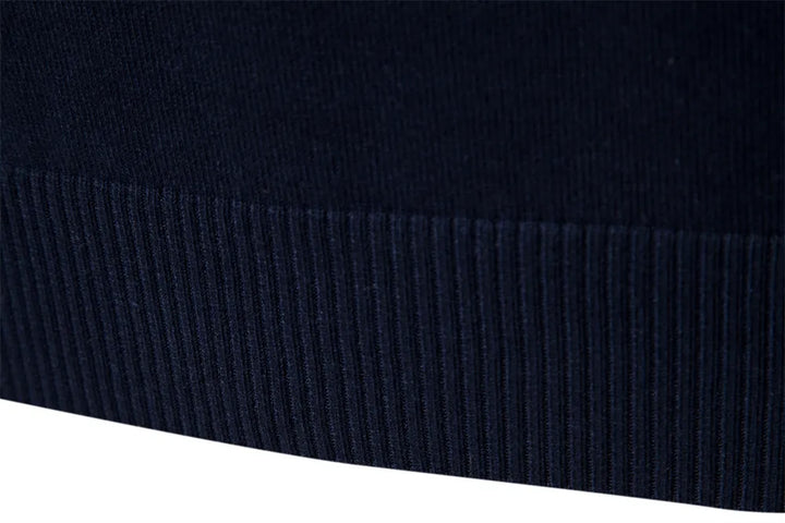 Men's fashion striped half-zip sweater. This warm long-sleeve casual pullover is a must for fall menswear.