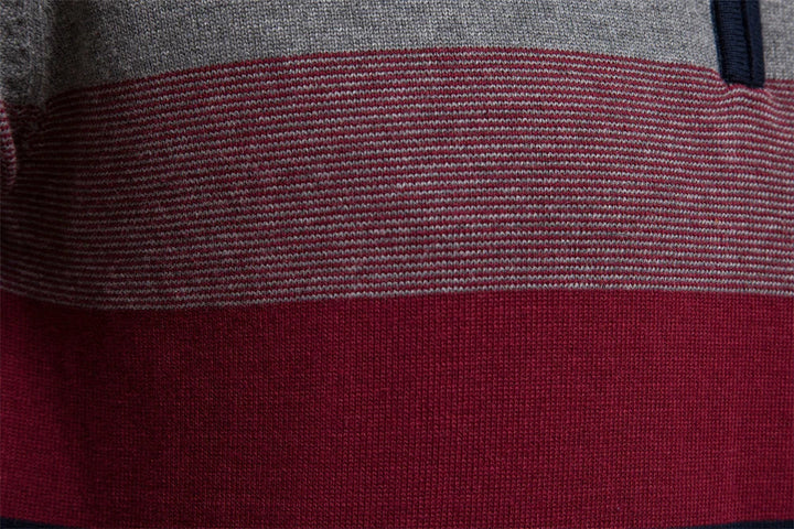 Men's stylish striped half-zip sweater. Warm long-sleeve fall fashion pullover for a casual layered look.