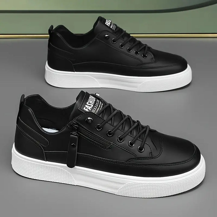 Side view of men's everyday comfort sneakers, highlighting the convenient side zip and lace-up closure.