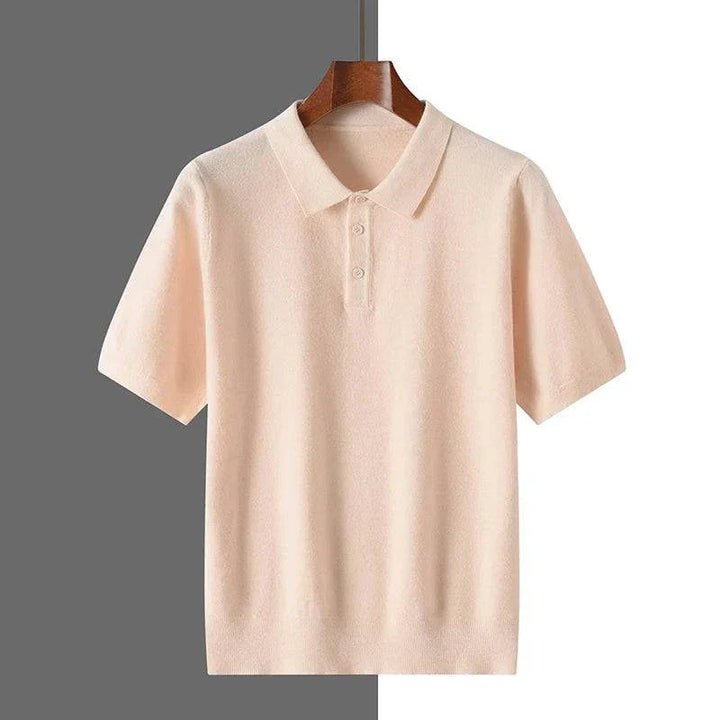 Classic men's polo shirt with button placket & ribbed cuffs. Timeless style, perfect for everyday casual fashion.