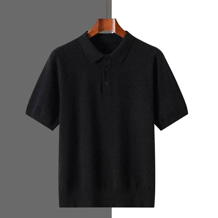 Comfortable men's polo shirt featuring a classic design, button placket, & ribbed cuffs. A versatile everyday top.