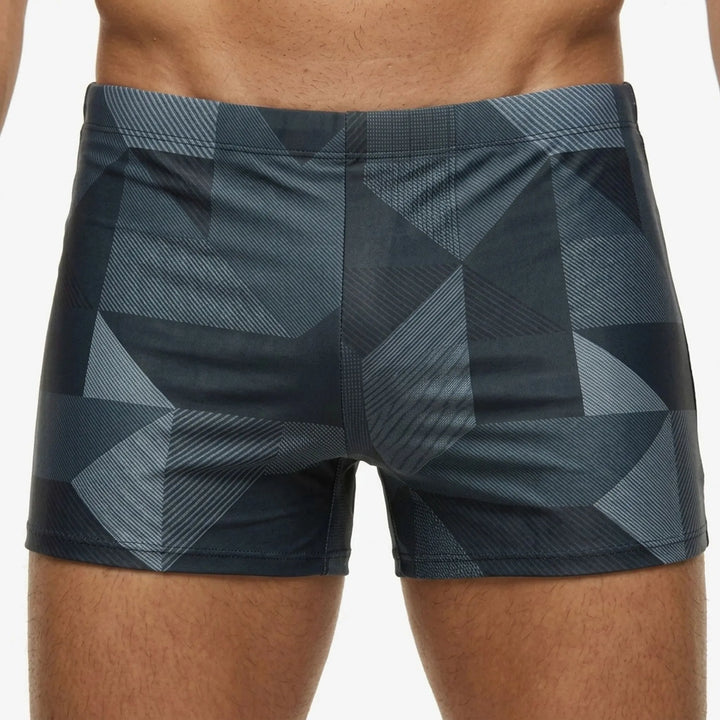 Sporty men's fitted swim boxer briefs for athletic performance and comfort.