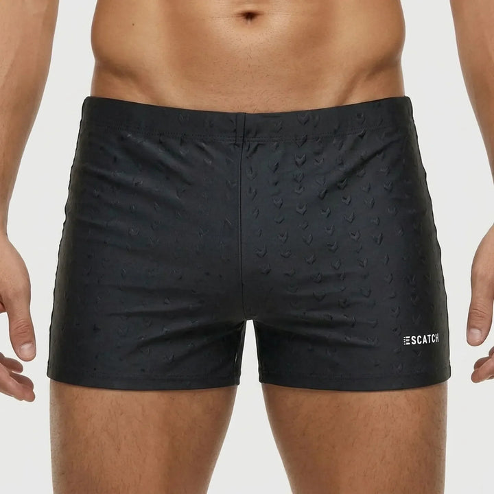 Men's fitted performance swim shorts, ideal activewear for pool, beach, and training.