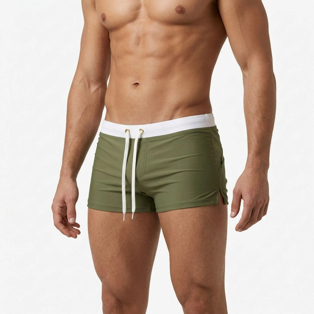 Fitted men's quick-dry swim trunks with elastic waist. Perfect beach & pool shorts for active summer.