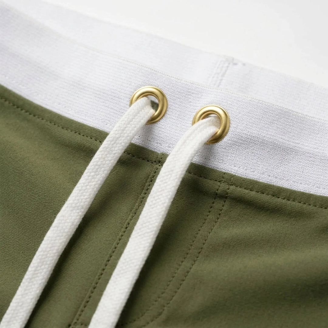 Athletic men's quick-dry swim trunks, ideal for beach, pool, or active summer fashion.