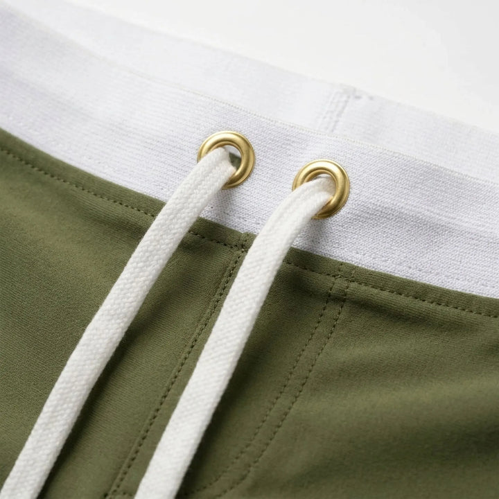 Athletic men's quick-dry swim trunks, ideal for beach, pool, or active summer fashion.
