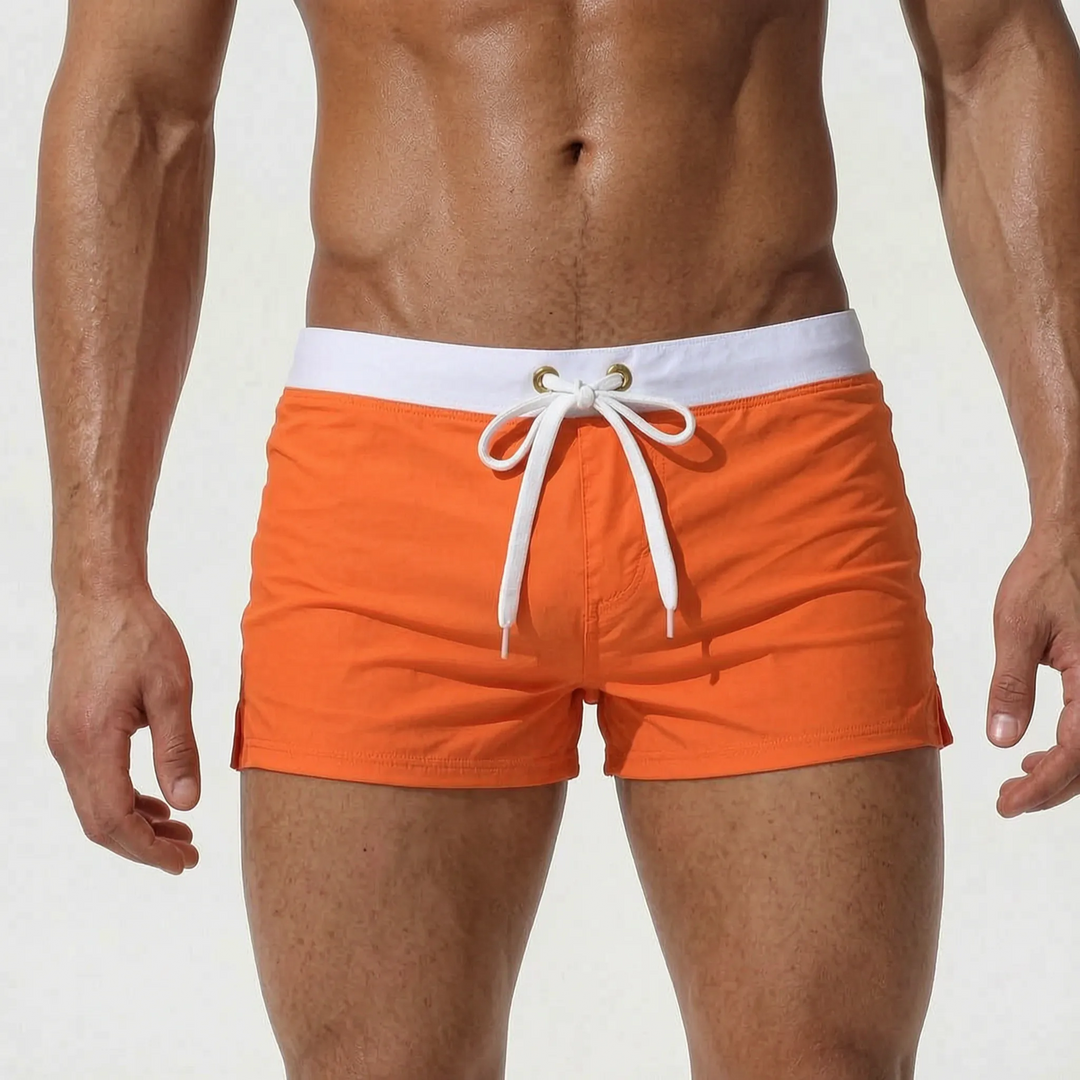 Men's brief-style fitted quick-dry swim trunks, ideal for swimming, sunbathing, and active wear.