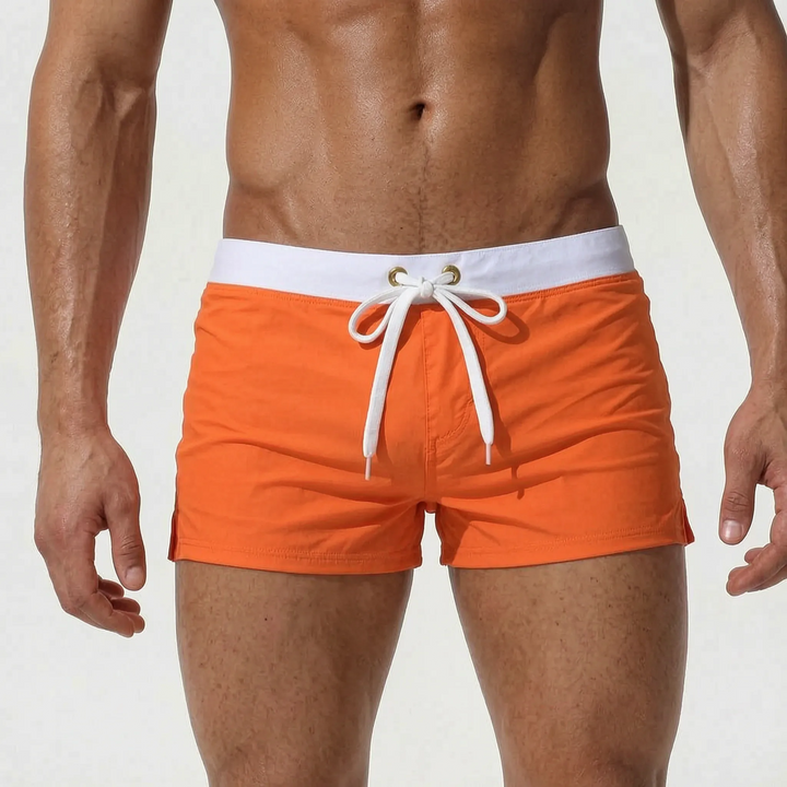 Men's brief-style fitted quick-dry swim trunks, ideal for swimming, sunbathing, and active wear.
