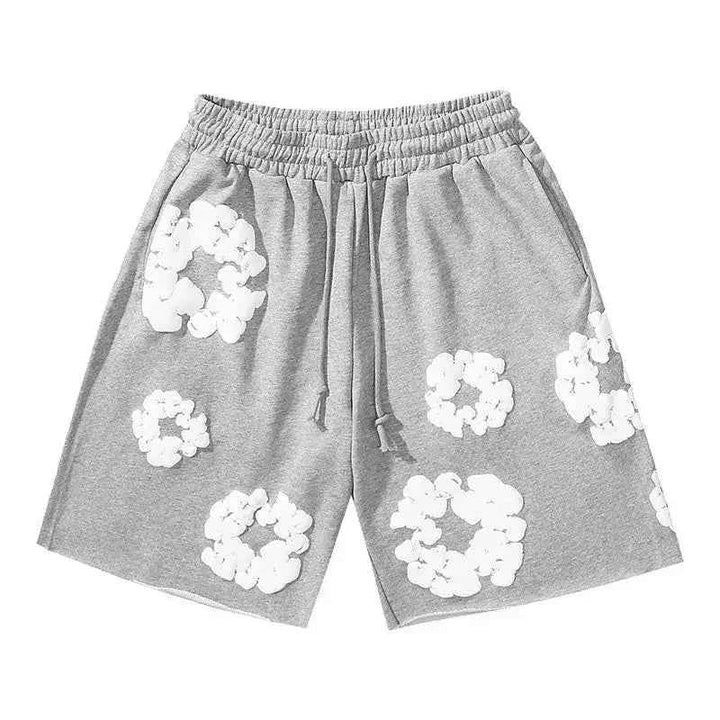 Bold floral print men's shorts, relaxed fit & comfortable drawstring waist for summer fashion.