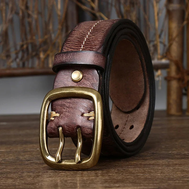 Durable full-grain leather men's belt, designed with a solid brass buckle for lasting semi-formal style.