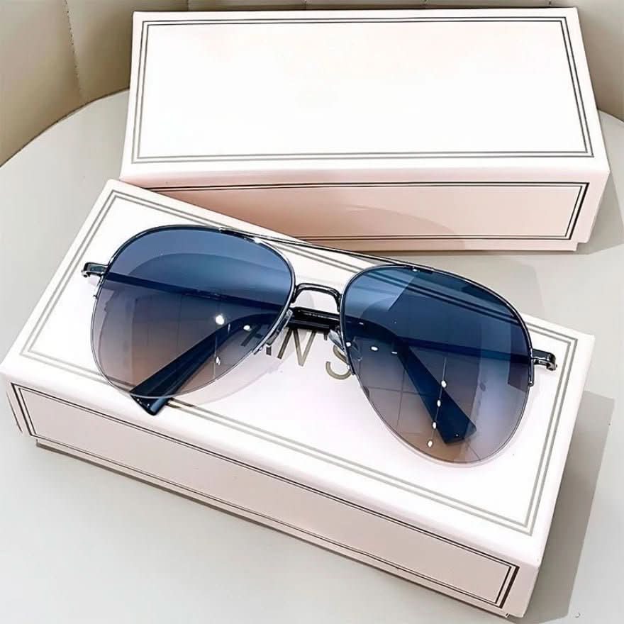 Side profile of men's aviator sunglasses with gradient lenses, UV400 sun protection.