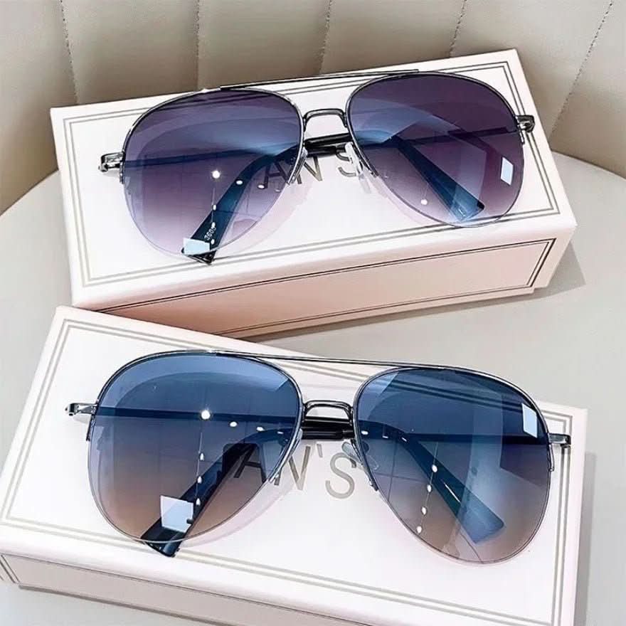 Stylish men's aviator sunglasses with gradient lenses & UV400 for sun protection.
