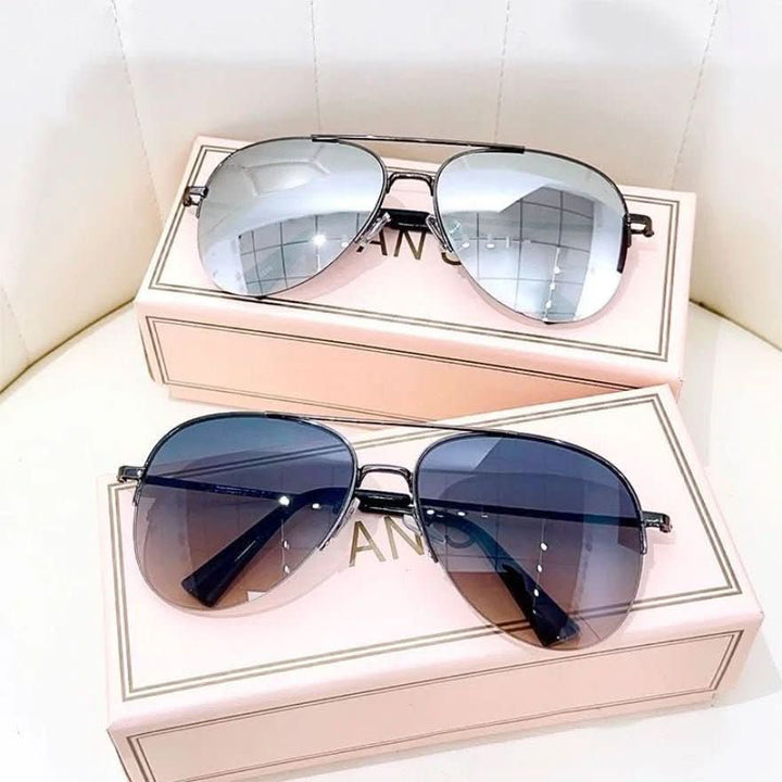 Modern men's fashion sunglasses, gradient pilot style, UV400 protection.