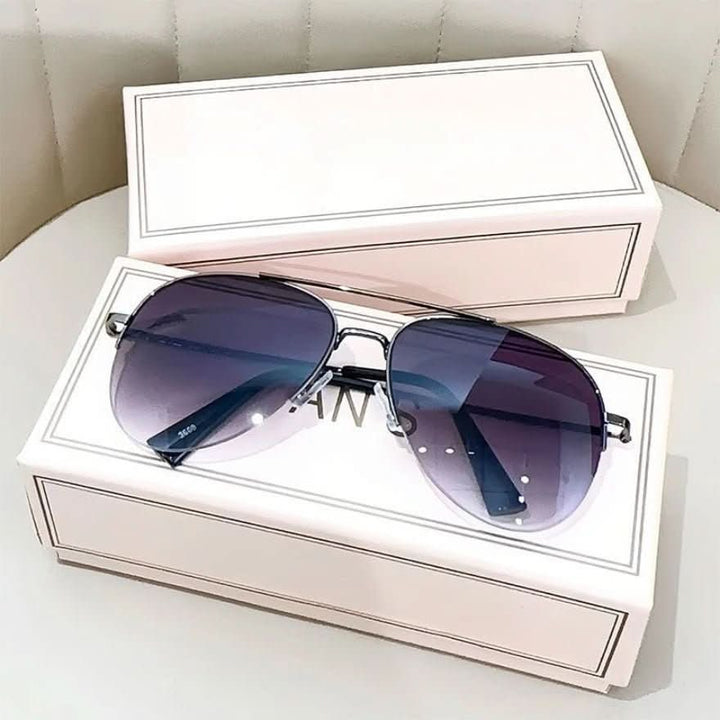 Man wearing stylish gradient pilot sunglasses, UV400 for outdoor sun protection.